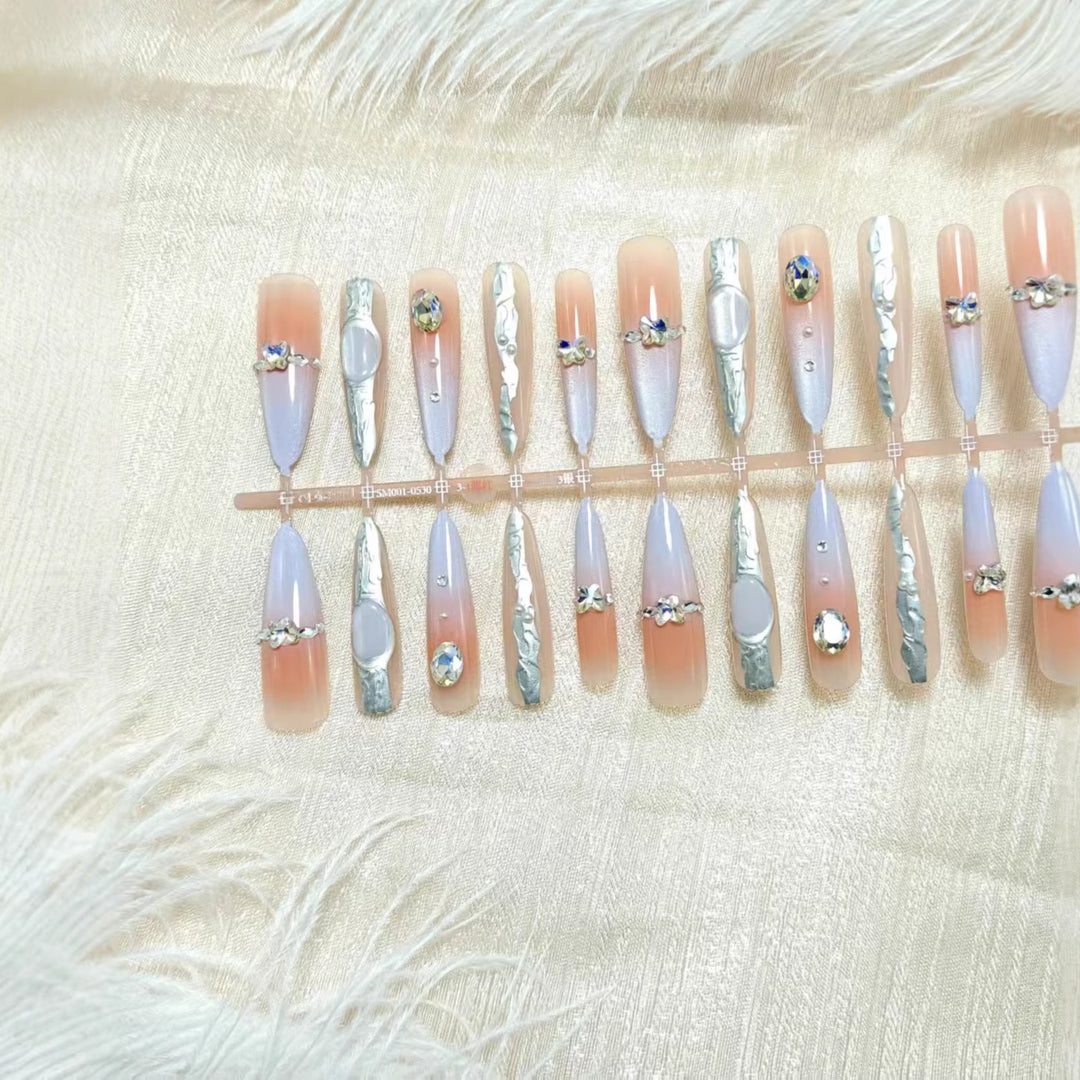 Artificial nails with elegant glitter design and fine 3D decorations Bowlift