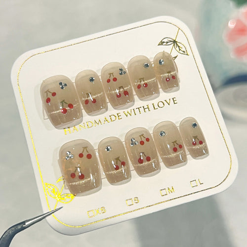 Artificial nails with cherry motif Bowlift