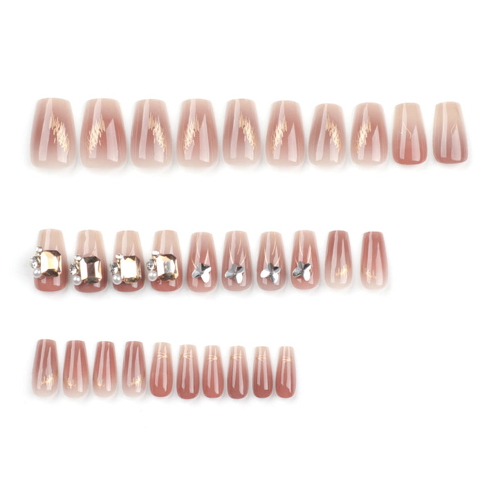 Artificial nail art with elegant jewelry accents Bowlift