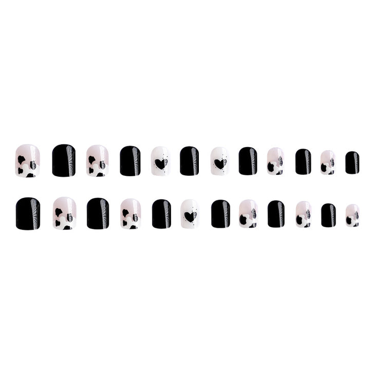 Creative nail art with heart and animal motifs Bowlift