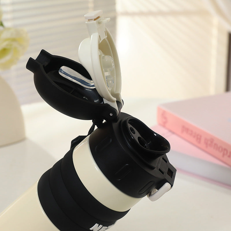 Women's Insulated Bottle with Playful Design and Practical Carry Handle Bowlift