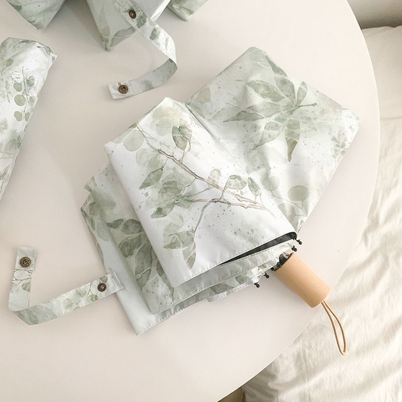 Women's folding umbrella with botanical print design Bowlift