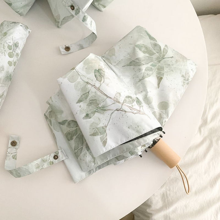 Women's folding umbrella with botanical print design Bowlift