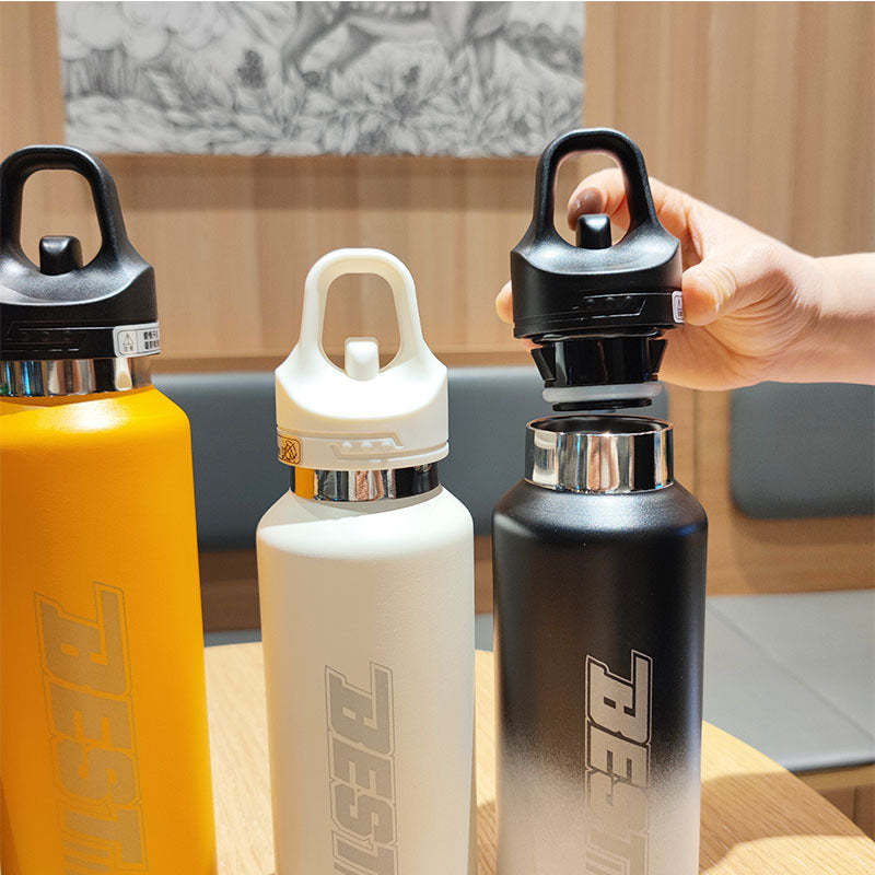 Women's sustainable stainless steel water bottle with leak-proof lid and handle Bowlift