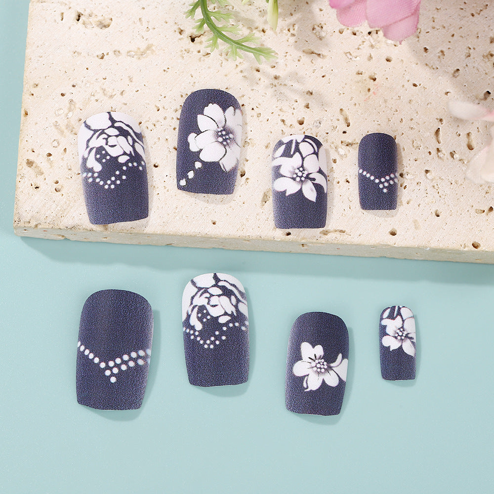 Artificial nails with elegant floral designs Bowlift
