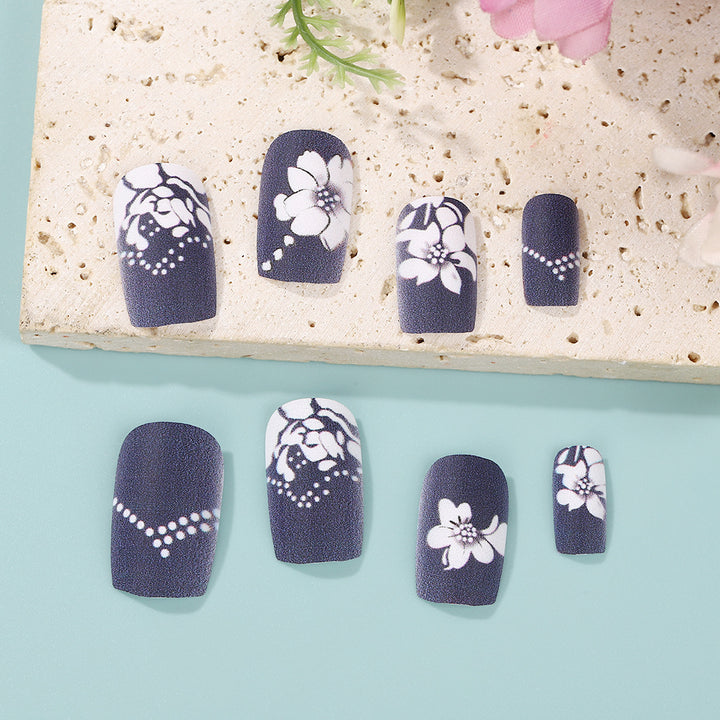 Artificial nails with elegant floral designs Bowlift