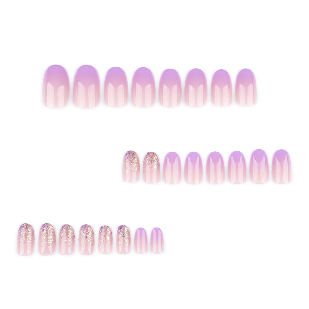Artful nail art with ombre design and glitter accents Bowlift
