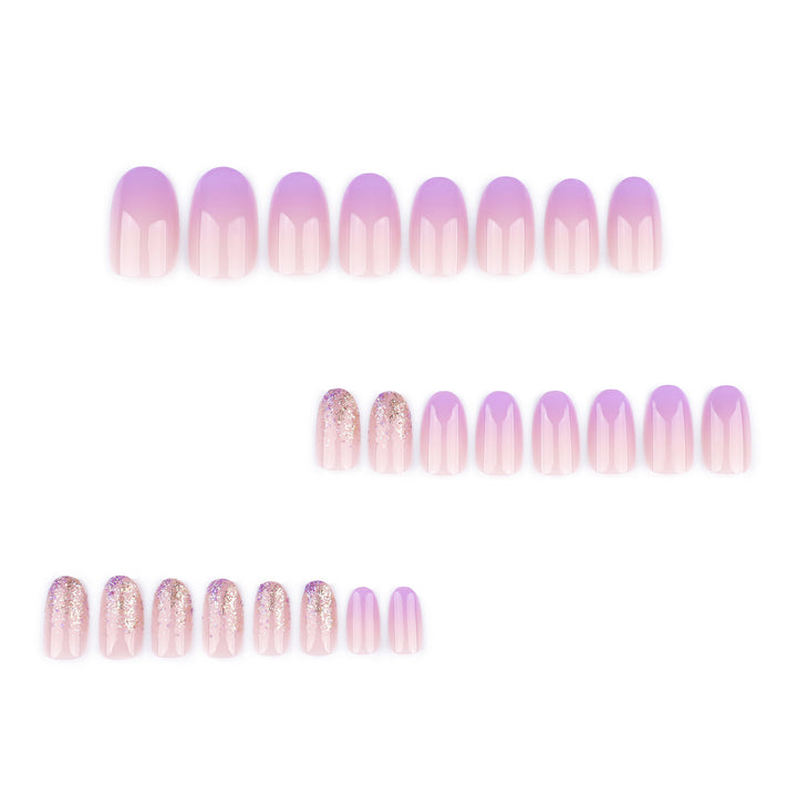 Artful nail art with ombre design and glitter accents Bowlift