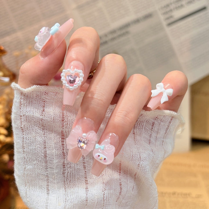 Artistic Press-On Nail Design with Decorative Silver Accents Bowlift