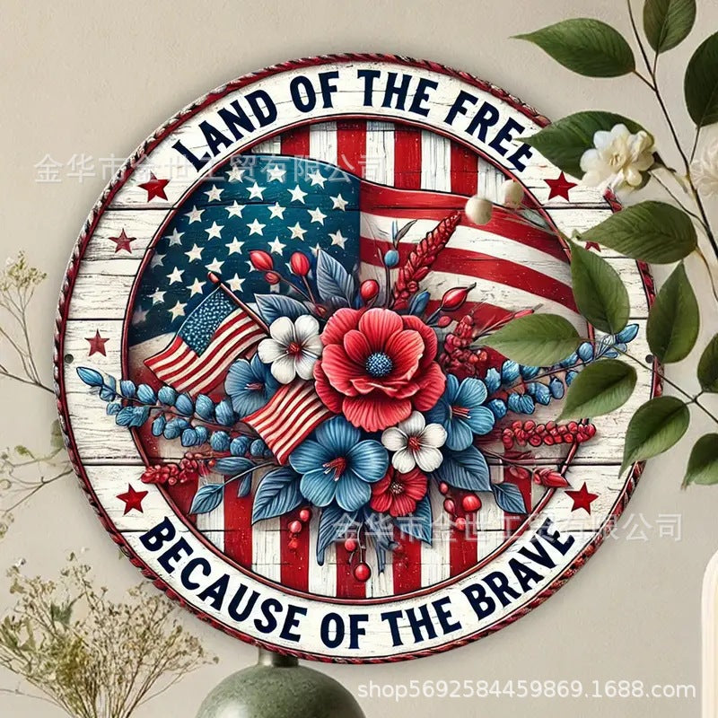 Independence Day rustic round wooden patriotic cross wall plaque with floral accents and God Bless America banner Bowlift