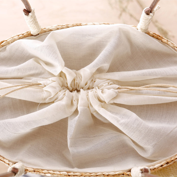 Beach bag with decorative flower detail embellishment Bowlift