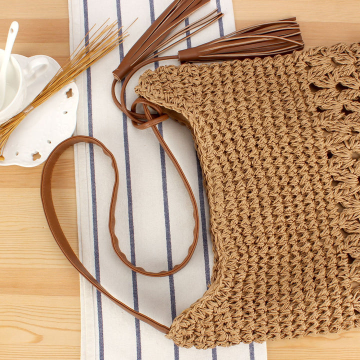 Shoulder bag made of hand-knotted natural material with fringed shoulder strap Bowlift