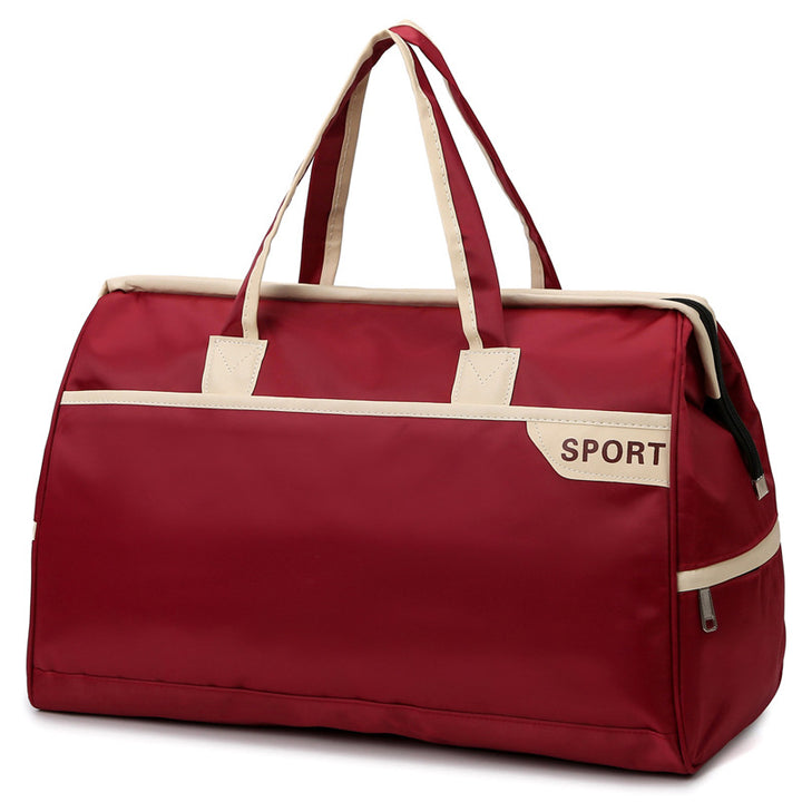 Sporty travel bag with reinforced handles and generous interior Bowlift