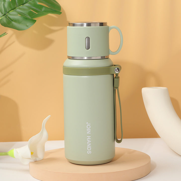 Women's insulated stainless steel drinking bottle with foldable cup Bowlift