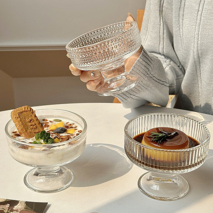 Footed glass dessert bowl with wide rim pedestal base for serving and display Bowlift