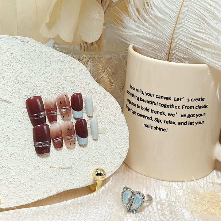 Trendy artificial nails with elegant metallic and gradient effects Bowlift