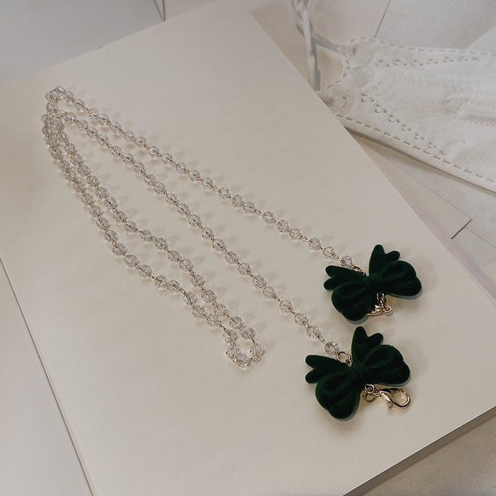 Jewelry holder chain with velvet bow pendant Bowlift