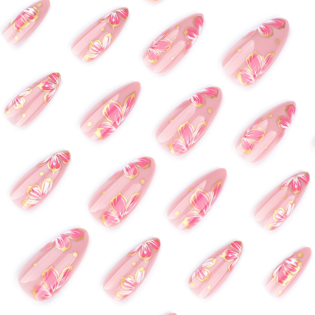Artful nail art with elegant floral designs and gold accents Bowlift