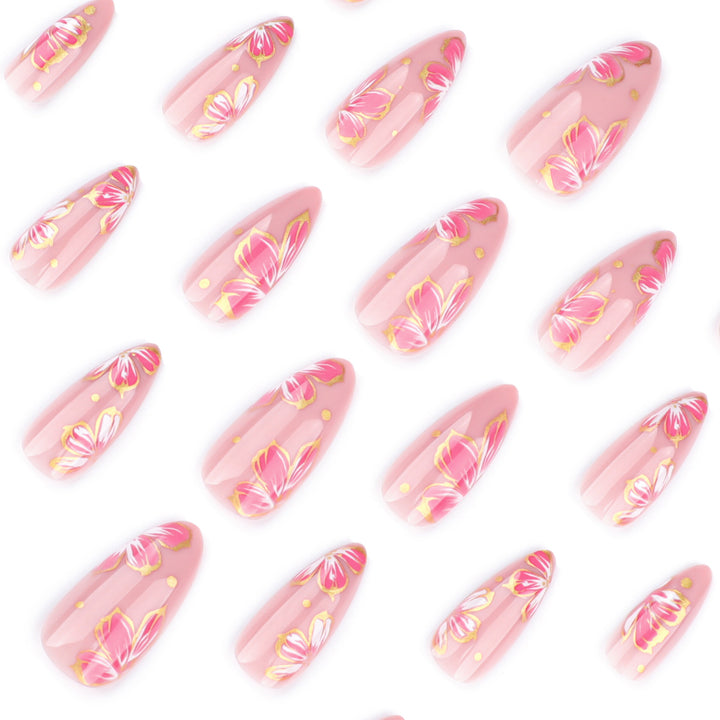 Artful nail art with elegant floral designs and gold accents Bowlift