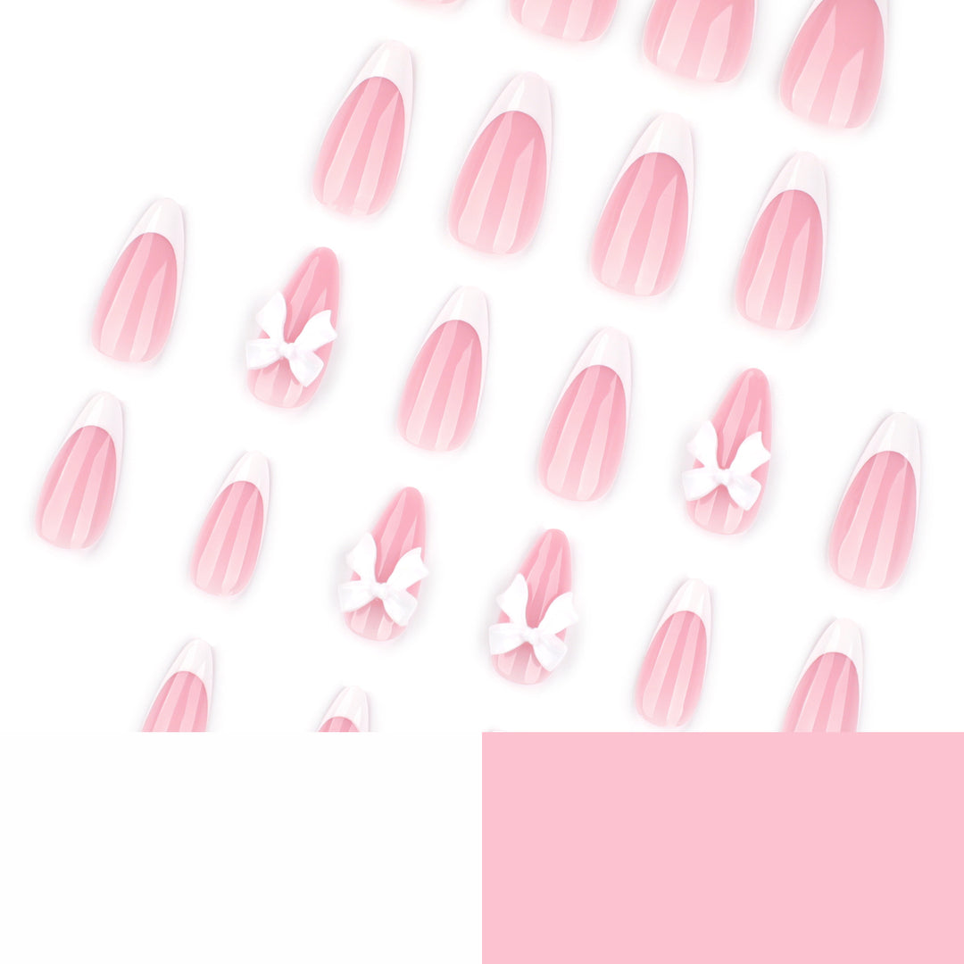 Artful nail designs with elegant tips and delicate bow motifs Bowlift