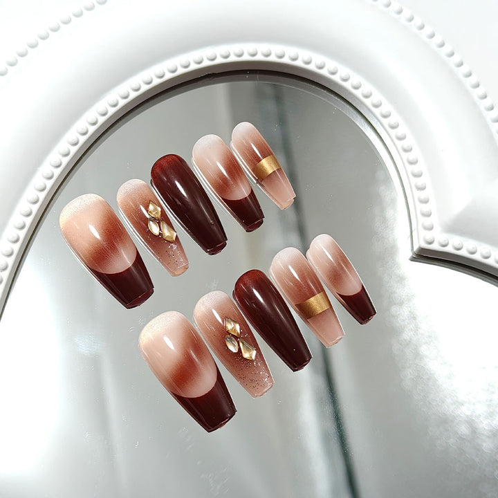 Artificial nails with luxury embellishments and stylish color gradients Bowlift