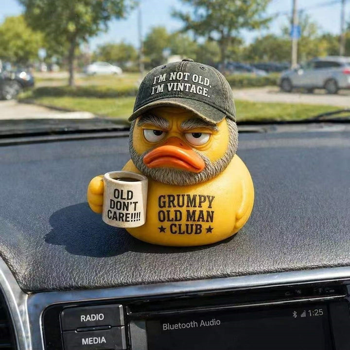 Funny rubber duck with vintage hat and cup Bowlift