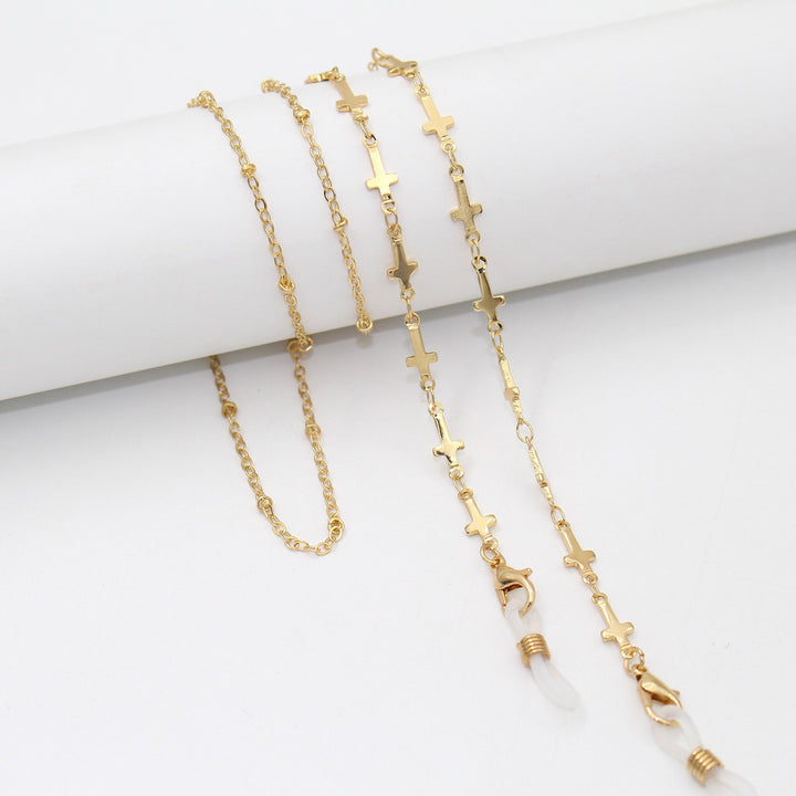 Elegant Cross-Embellished Eyewear Chain Bowlift