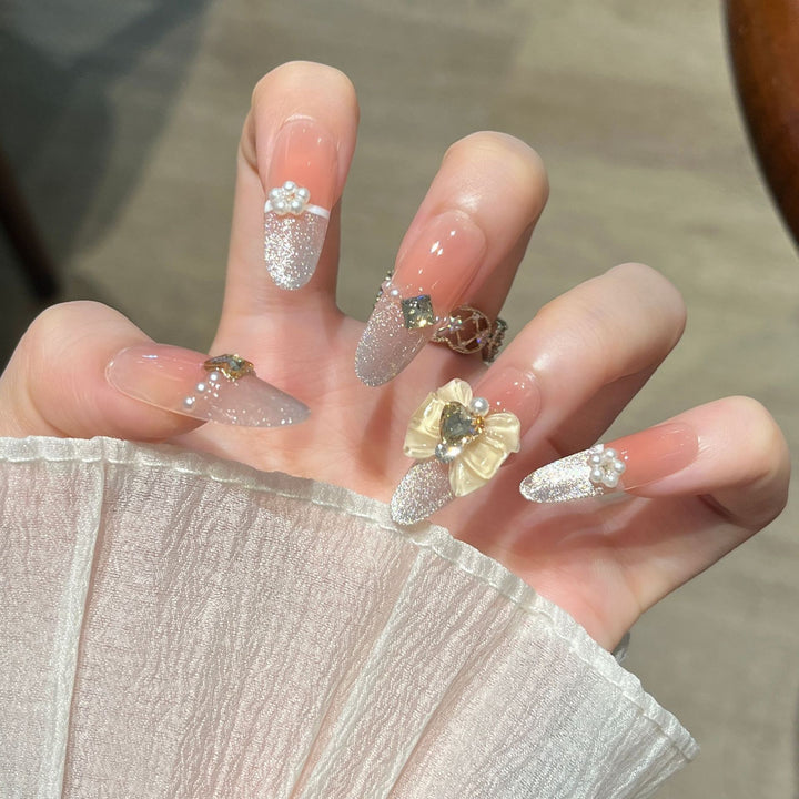 Glamorous Rhinestone-Embellished Nail Art Extensions Bowlift