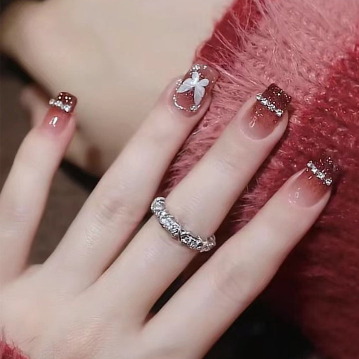Glamorous Press-On Nail Set with Decorative Gemstone Accents Bowlift