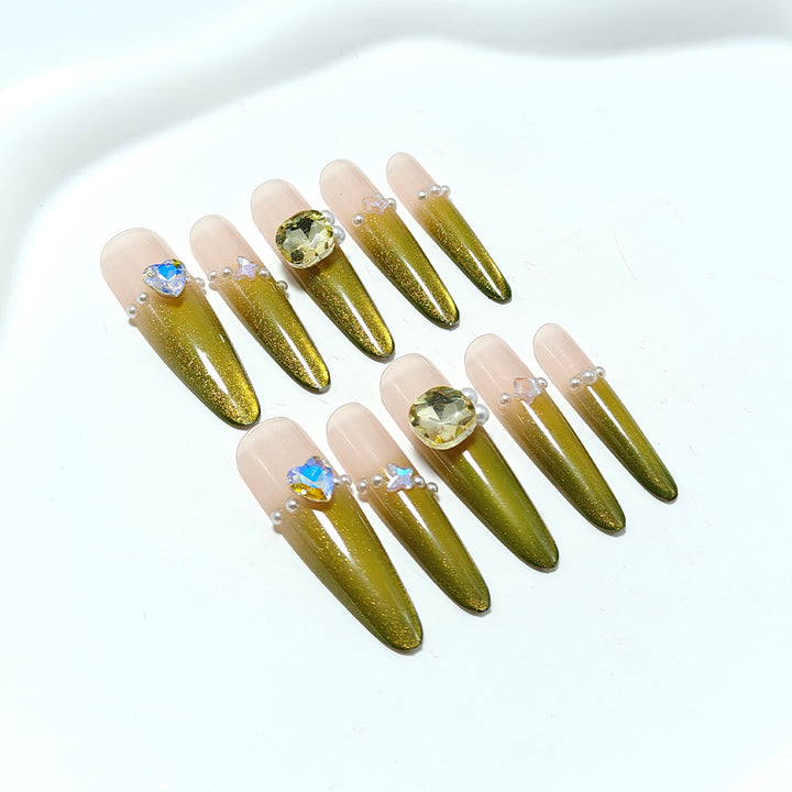 Artificial nails with Elegant Ombre Effect and Glitter Accents Bowlift