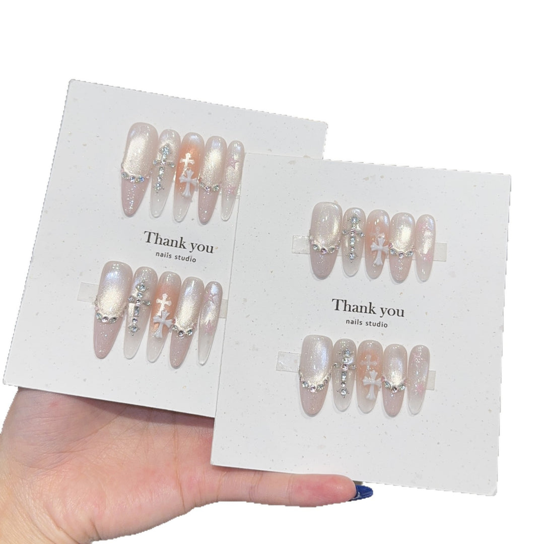 Artificial nails with sparkling rhinestone and glitter effects Bowlift