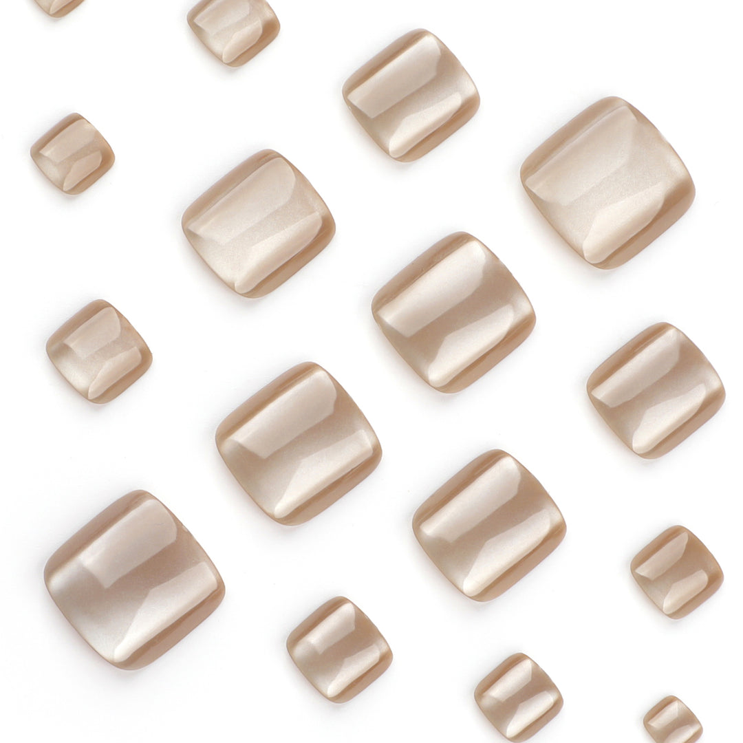 Artful nail art with glitter accents and soft ombre effect Bowlift