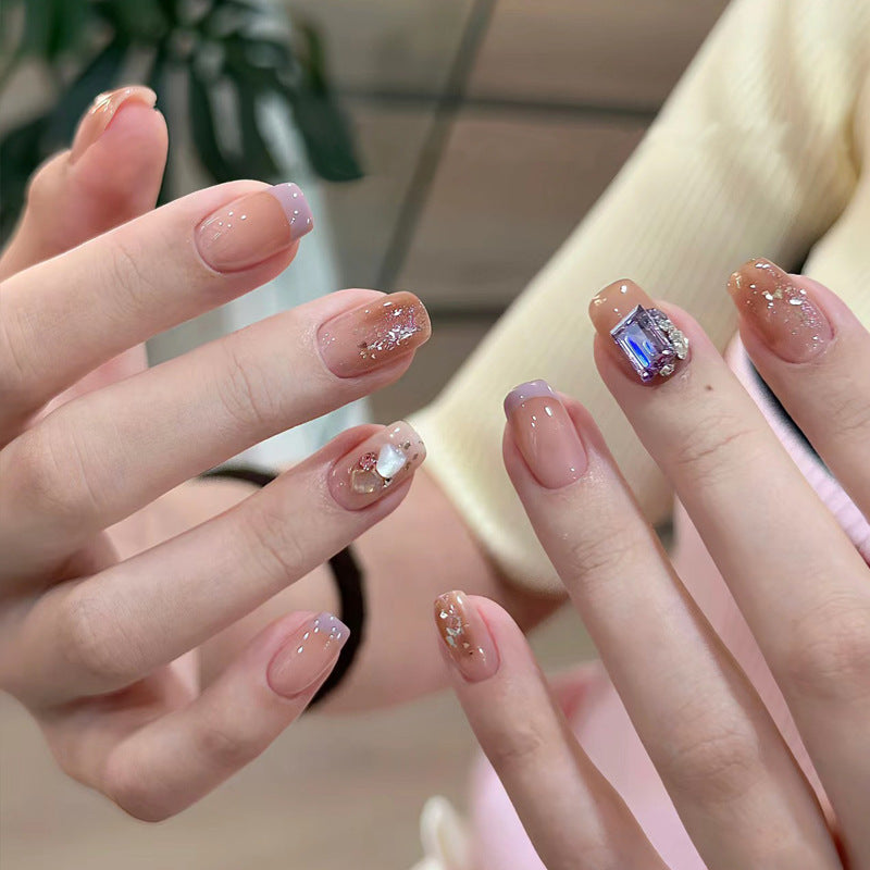 Elegant Press-On Nail Set with Artistic Glitter and Decorative Accents Bowlift