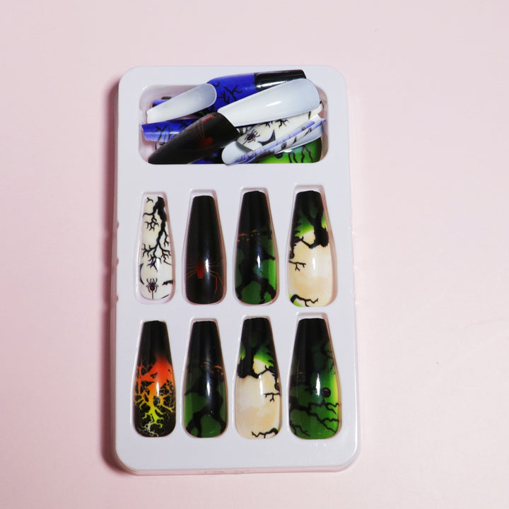 Artistic Press-On Nail Design with Dripping Effect Bowlift