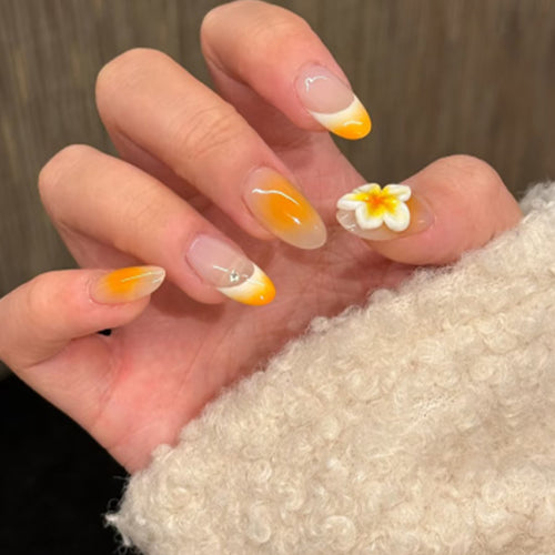 Artful nail extensions with delicate ombre effect and floral accents Bowlift