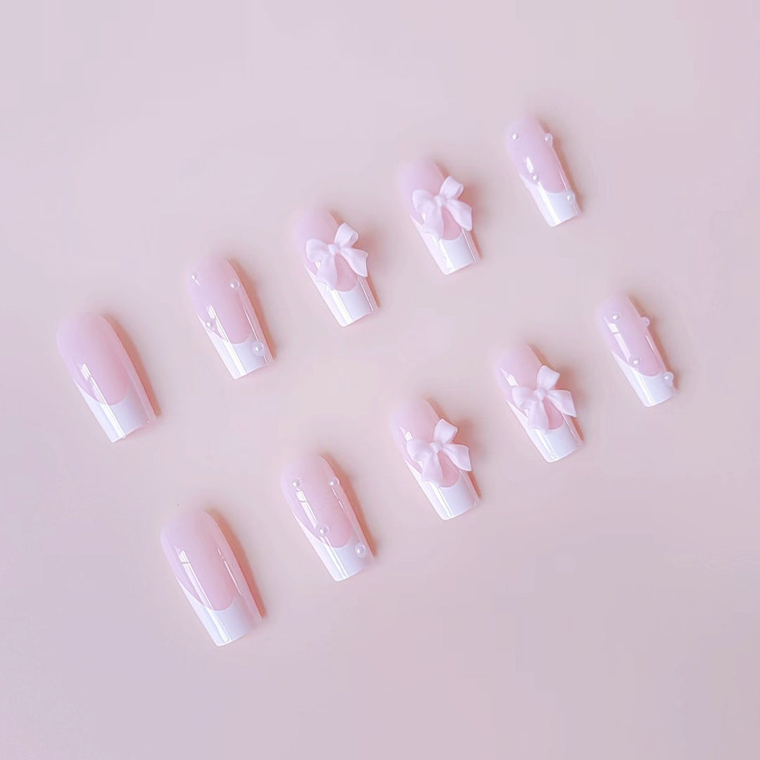Artificial nail set with elegant bow and pearl decorations Bowlift