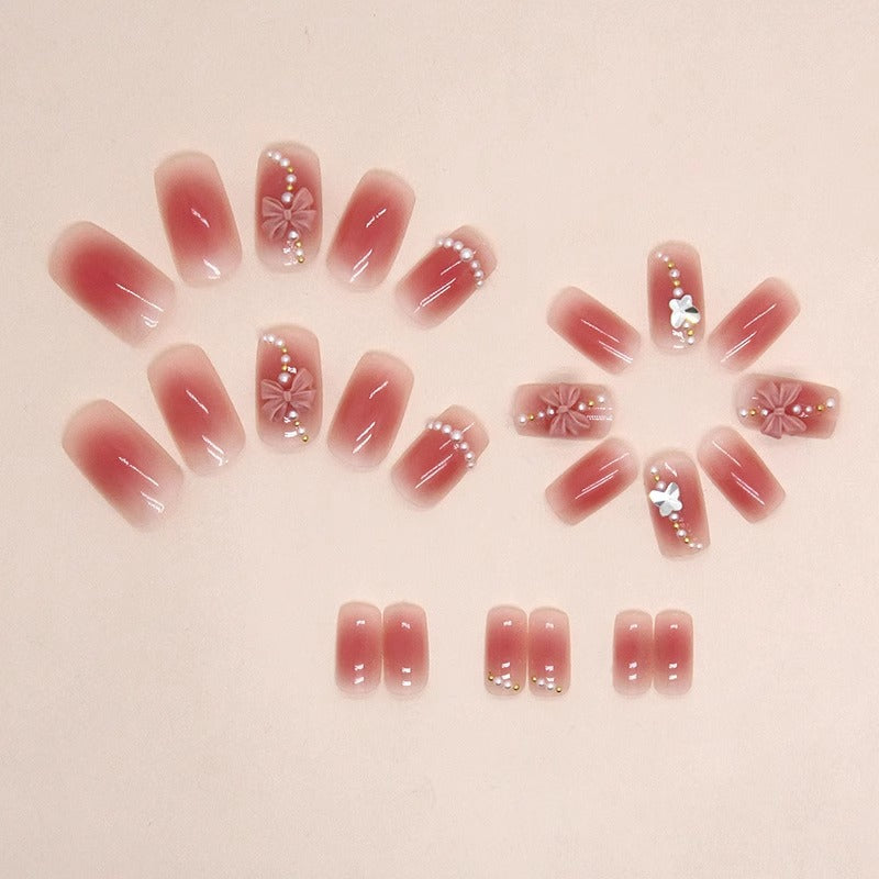 Artificial nails with perforated flower pattern Bowlift