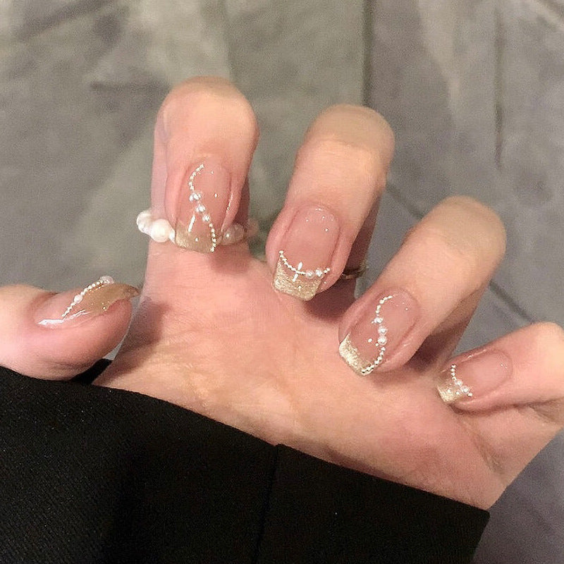 Glossy Nail Art Set with Sparkling Glitter Accents Bowlift