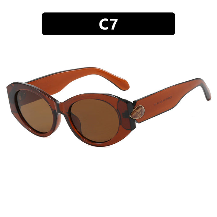 Women elegant sunglasses with stylish contours Bowlift