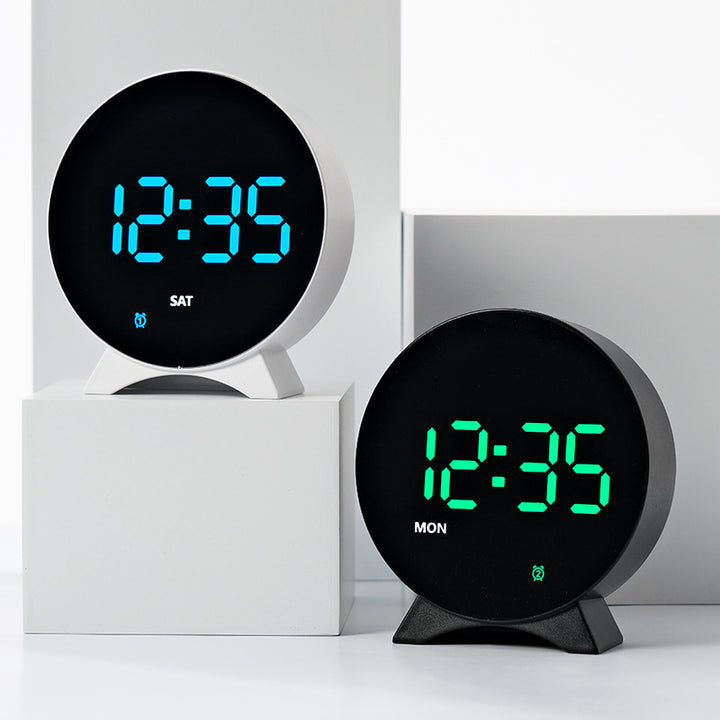 Digital alarm clock with large LED display and adjustable light sensor Bowlift