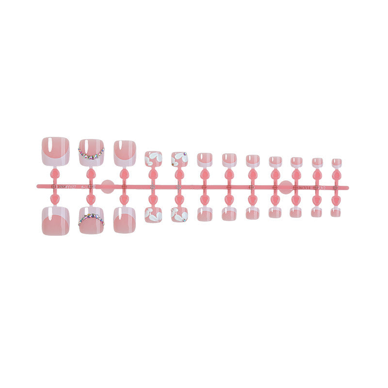 Creative nail art set with elegant flower designs and glitter accents Bowlift