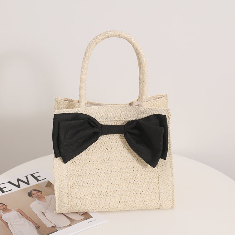 Elegant Bast handbag with bow detail Bowlift