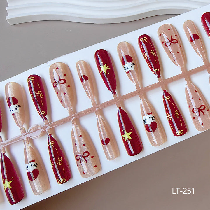 Artificial nails in festive Christmas design Bowlift