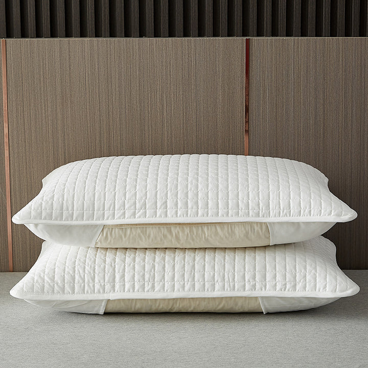 Quilted breathable zippered pillow protector with hypoallergenic padding Bowlift