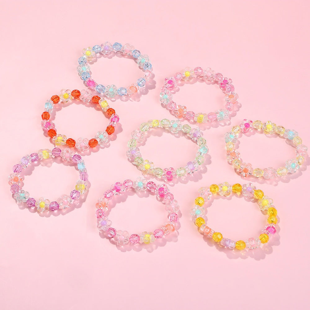 Friendship bracelet with colorful flower motifs Bowlift