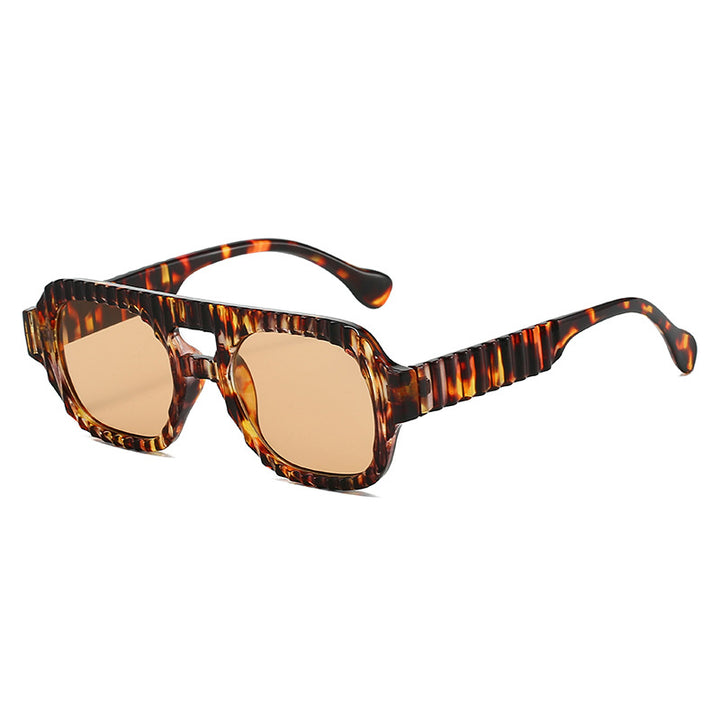 Ladies fashionable sunglasses in futuristic design with textured frame Bowlift