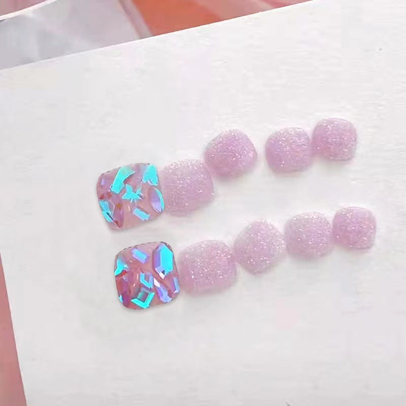 Glamorous artificial nails with sparkling glitter Bowlift