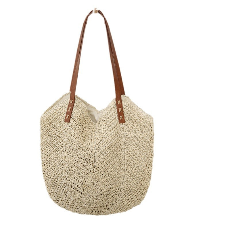 Braided basket bag with sturdy leather handles Bowlift