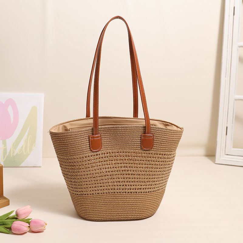 Elegant Bast bag with leather accents Bowlift