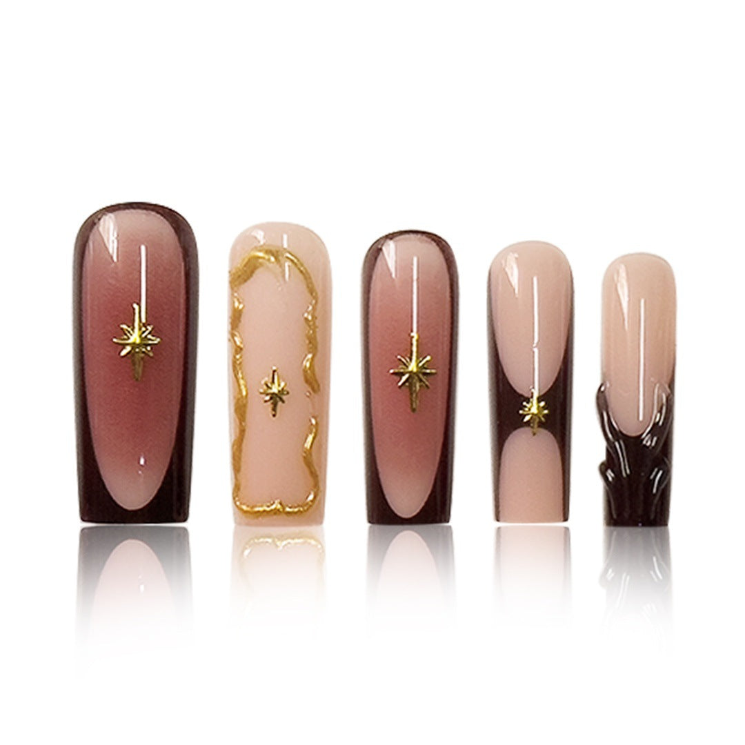 Artistic Long Press-On Nail Art Extensions with Gold Detailing Bowlift